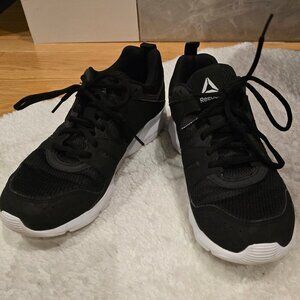 Reebok trainer black top white sole woman